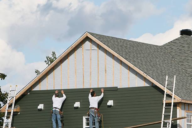 Professional Siding Replacement technician working in Wellsville, OH